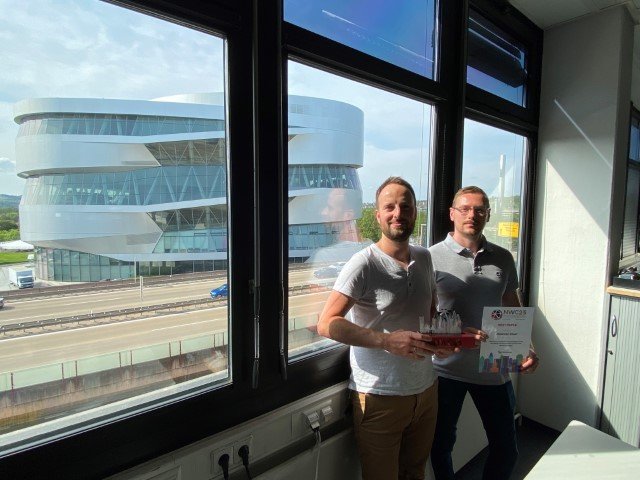 Alexander Kriwet and Fabian Urban from Mercedes Benz - Winners of Best Paper at NAFEMS World Congress 2023, pictured with their award.